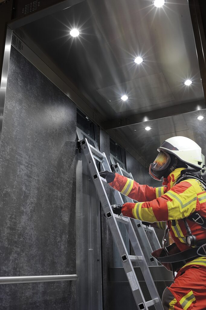 Firefighter in Lift